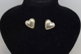 A pair of Tiffany & Co silver heart earrings, marked Tiffany & Co, 925 Mexico, no backs