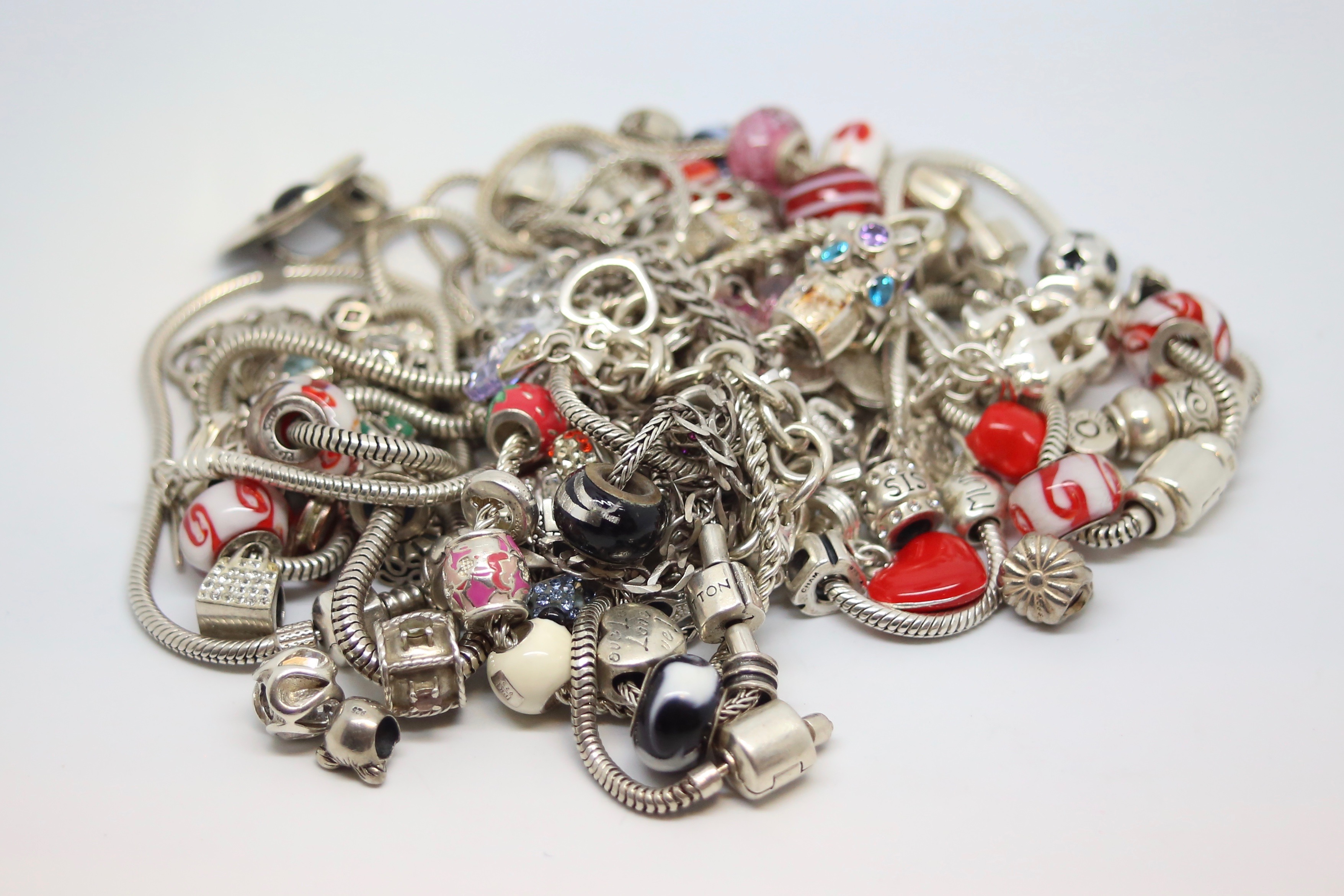 A selection of silver charm bracelets and charms including Chamilia - Image 2 of 2