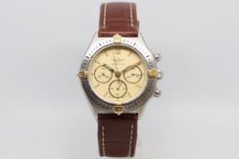 Gentlemen's Breitling Chronograph Wristwatch, circular beige dial with baton hour markers and