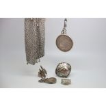 A selection of silver items including a mesh purse and a Georg Jensen ring