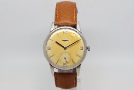 Gentlemen's Longines Oversized Vintage Wristwatch, circular heavy patina dial with hour baton