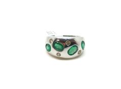 Emerald and diamond dress ring, four oval cut emeralds and four round brilliant cut diamonds rubover
