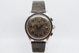 Gentlemen's Tissot Black Gilt Dial Chronograph Wristwatch, circular black gilt dial twin sub dials