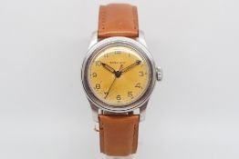 Gentlemen's Longines Vintage Military Watch, circular patina dial with Arabic numerals and an