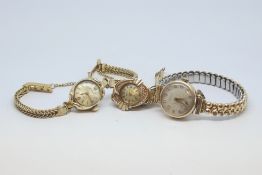 Three ladies 9ct watches including Enicar and Accurist