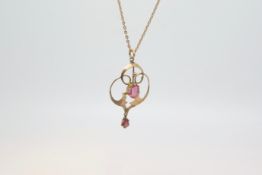 Art Nouveau pendant, set with garnets, micro link chain stamped and tested as 9ct