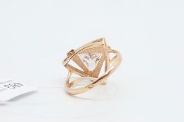 Single stone ring, central triangular cut cubic zirconia in an open work triangular setting, mounted