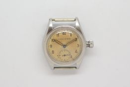 Gentlemen's Vintage Rolex Oyster Wristwatch, circular heavy patina dial with arabic numerals and a