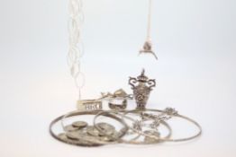A quantity of mainly silver items including bangles and pendants, approximately 80g gross
