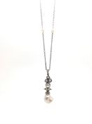 Natural pearl and diamond necklace, natural light grey saltwater pearl suspended from an articulated