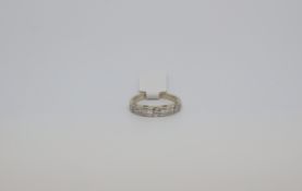 Diamond half eternity ring, brilliant and baguette cut diamonds, three brilliant cut diamonds