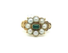 Georgian emerald and diamond ring, central emerald surrounded by eight split pearls, with carved