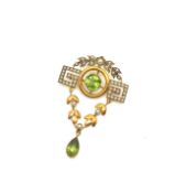 Edwardian peridot and pearl pendant brooch, central round cut peridot with seed pearl set detail,