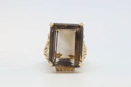 Single stone quartz ring, large smoky quartz measuring 22 x 16mm, mounted in 18ct yellow gold