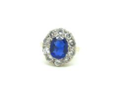 Burmese sapphire and diamond cluster ring, central oval cut burma sapphire weighing 2.19ct,