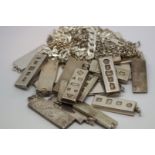 Quantity of silver ingot pendants, together with silver chains, approximately 730g gross
