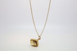 Citrine fob, mounted in 9ct gold, suspended from a 9ct gold belcher chain