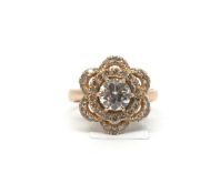 Rose gold brilliant cut diamond dress ring, central brilliant cut diamond estimated weight 1.00ct,