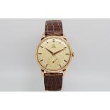 Gentlemen's Omega 18ct Rose Gold Vintage Wristwatch, circular textured dial with gold baton hour