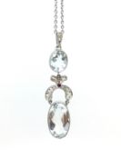 Aquamarine and diamond drop necklace, oval cut aquamarine measuring 18.45 x 10mm, set from an old