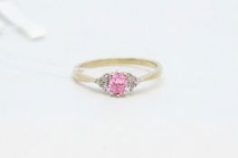 Cubic zirconia cluster ring, set with pink and white cubic zirconia's mounted in 9ct yellow gold