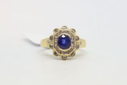 A sapphire and diamond dress ring, mounted in yellow metal with worn hallmarks, ring size N1/2