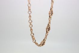 9ct rose gold Albert chain, embrossed and pierced links, length approximately 50cm, weight