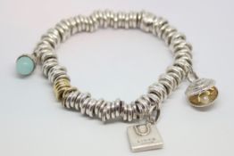 Two links of London bracelets with charms
