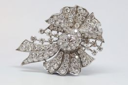 Diamond spray brooch, round brilliant cut diamonds, set in a bow spray, estimated total diamond