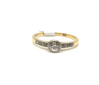 Single stone diamond ring, central old cut diamond weighing an estimated 0.30ct, with four