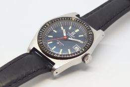 Gentlemen's Tissot PR-516 Automatic Wristwatch, circular teal blue dial with luminous green baton
