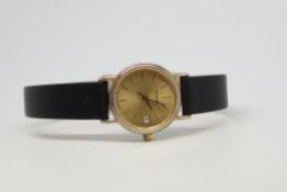 Ladies Tissot Date Wristwatch, circular champagne dial with baton hour markers and date aperture,