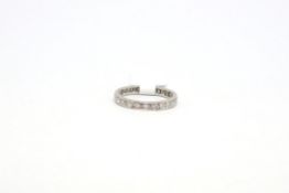 Diamond full eternity ring, round cut diamonds set within a 2.5mm wide band, in white metal tested