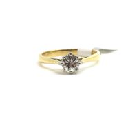 Single stone diamond ring, central round brilliant diamond weighing an estimated 0.37ct, in yellow