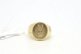 Large yellow metal signet ring, depicting crest with scimitars, Arabic or eastern inscription,