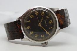 Gentlemen's Eterna Vintage Military Over szied Wristwatch, circular black centre second dial with