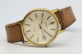 Gentleman's Omega Geneve Date Vintage Wristwatch, center second circular dial with date aperture