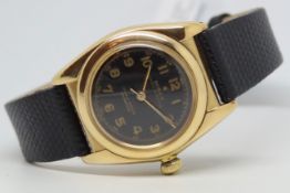 Gents Rolex Bubble Back 18ct Gold Vintage Wristwatch, circular black gilted dial with arabic