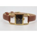 Ladies Jaeger Le Coultre 18kt Gold Wristwatch, rectangular black dial gold baton hour markers, in