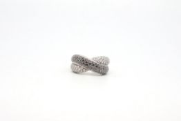 Crossover diamond ring, pave set black and white diamonds, in a crossover position, mounted in