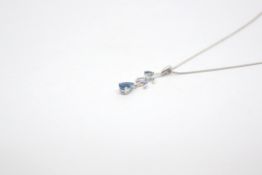 Blue and white topaz and diamond pendant, pear cut blue topaz suspended drop a vine of blue and