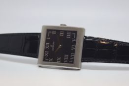 Corum Buckingham wrist watch, square black dial with Roman numerals, 37mm stainless steel square