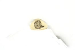 Yellow metal signet ring stamped 18ct, weighing approximately 4.1g