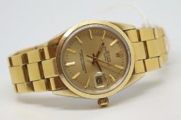 Gentleman's Rolex Oyster Perpetual Date w/ Box & Papers, circular champagne dial with gold baton