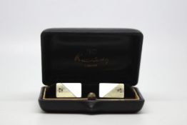 Kutchinsky cufflinks, in white and yellow gold with a single diamond to each, Kutchinsky box,