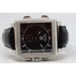 Gentleman's Tag Heuer Monaco 69 Wristwatch w/ Paperwork, square black dial with baton hour markers