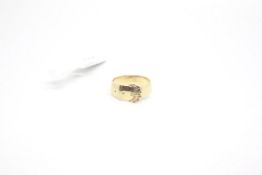 Yellow metal buckle ring stamped 9ct, a/f, weighing approximately 5.0g