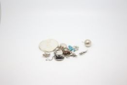 A quantity of mostly silver jewellery including Disney themed items, Alice in Wonderland, Tinkerbell