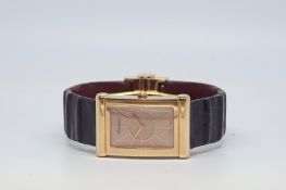 Baskania 18ct rose gold dress watch, rectangular salmon dial with radial rose gold hour markers 25mm