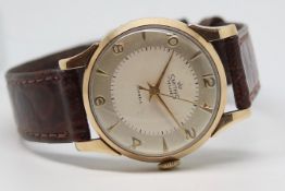 Gents Smiths Deluxe 9ct Gold Vintage Wristwatch, circular two tone dial with gold arabic numerals
